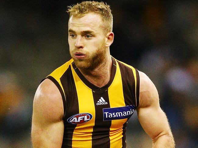 MELBOURNE, AUSTRALIA - JULY 22:  Tom Mitchell of the Hawks runs with the ball during the round 18 AFL match between the Carlton Blues and the Hawthorn Hawks at Etihad Stadium on July 22, 2018 in Melbourne, Australia.  (Photo by Michael Dodge/Getty Images)