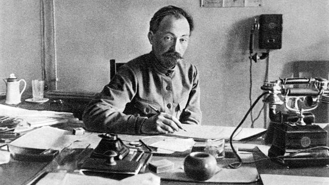 Felix Dzerzhinsky, head of the Soviet secret police, the Cheka, in his Moscow office in 1918.