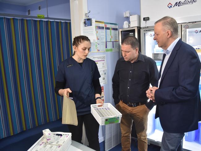 Nurse manager Jessica Craig showing Labor candidate for Flynn Matt Burnett and leader of the opposition Anthony Albanese Covid-19 vaccines