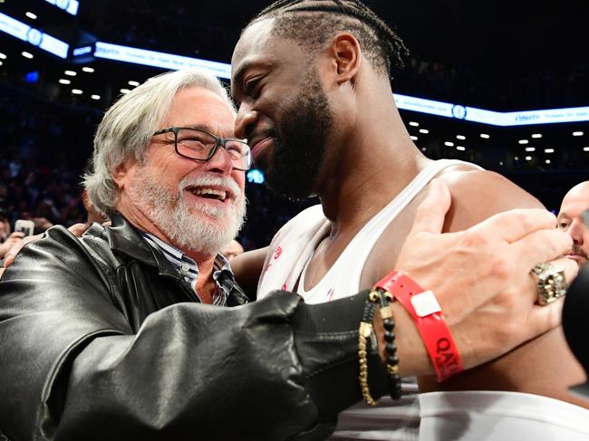 Dwyane Wade #3 of the Miami Heat hugs Miami Heat owner Micky Arison after the game against the Brooklyn Nets at Barclays Center on April 10, 2019 in the Brooklyn borough of New York City. Picture: Getty