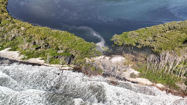 Drone shots attached of the area where water has flowed over Bribie Island and where the next breakthrough could happen. , Photos: Shane T Reynolds
