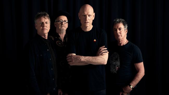 Sydney rock band Midnight Oil, whose 13th album will be released by Sony in 2022. L-R: Martin Rotsey (guitar), Jim Moginie (guitar/keyboard), Peter Garrett (vocals) and Rob Hirst (drums). Picture: Daniel Boud