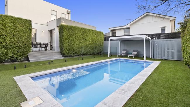 Another entertainer’s deck overlooks the pool.