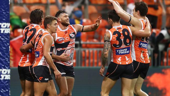 GWS players celebrate one of many goals. Picture: Getty Images