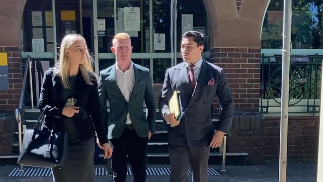 Gareth Charles Dunlop left Moss Vale Courthouse flanked by his high-flying legal team. Picture: Adelaide Lang