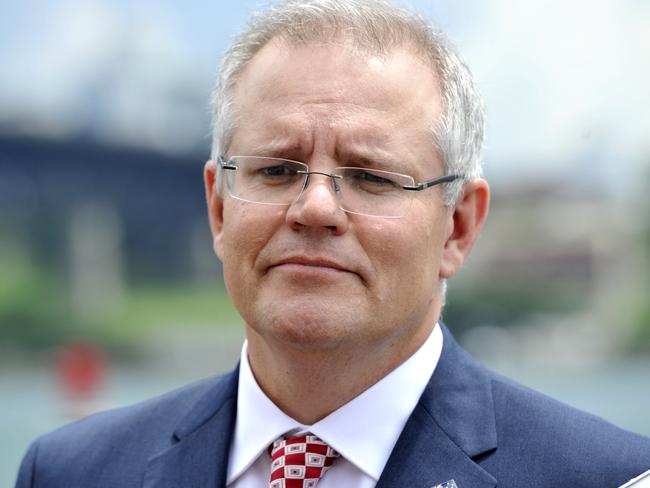 Federal Treasurer Scott Morrison wants to tax digital products bough overseas to make it fairer for Aussie businesses. Picture: AAP/Joel Carrett