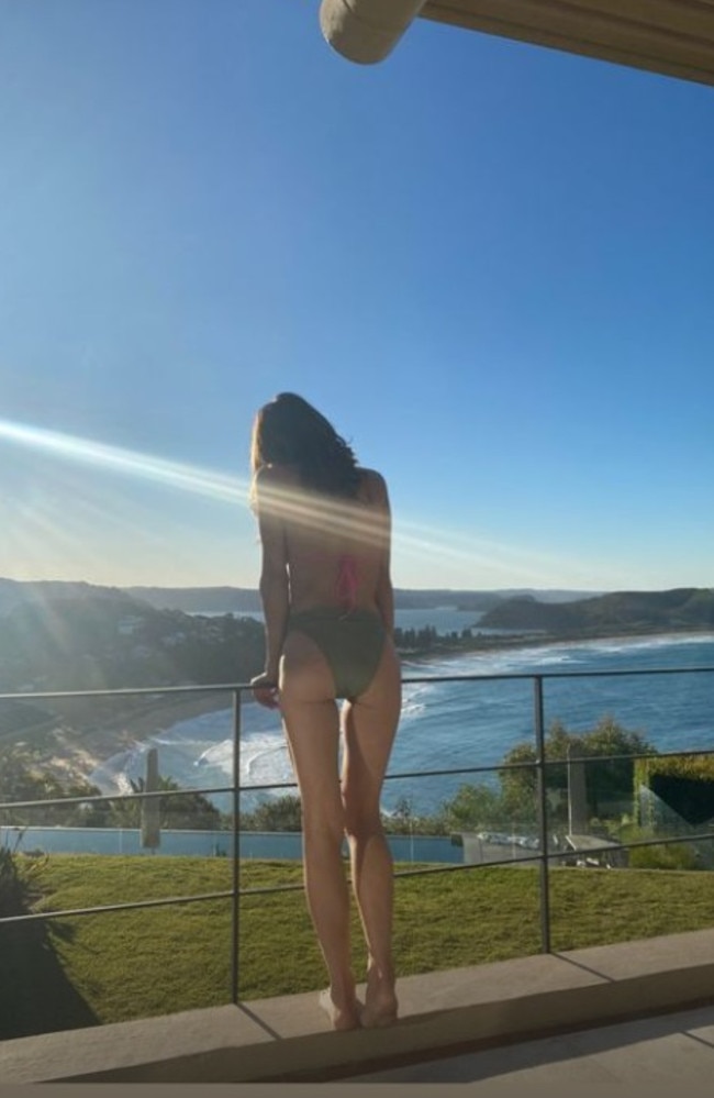 She posed on a balcony in Sydney while enjoying ocean views. Picture: Instagram/kylyclarke