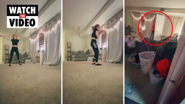 Terrifying moment 'stalker' bursts into woman's apartment