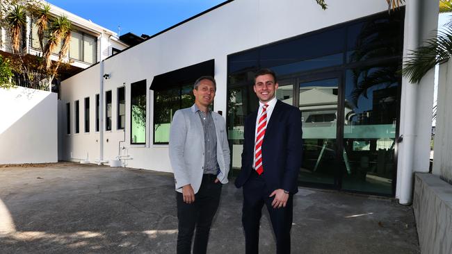 Owner Daniel Laruccia and Chase agent Jordan Gentile in front of Sypre's head office. (AAP Image/Richard Waugh)