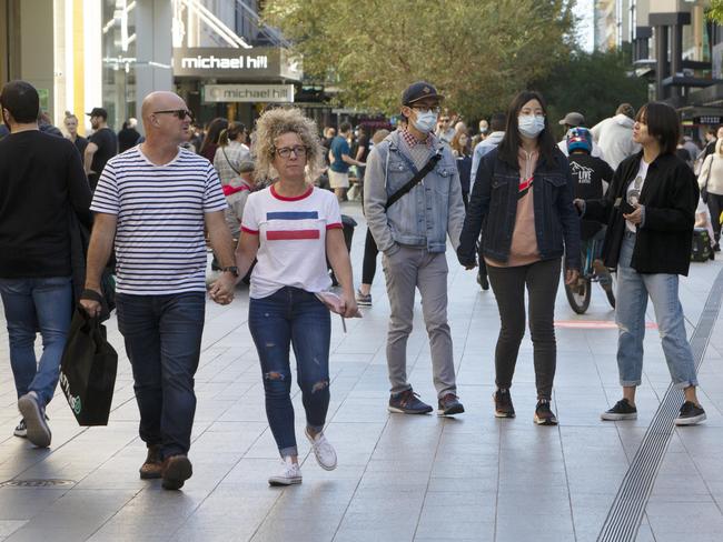 Saturday afternoon in Adelaide post Corona Virus lockdown. A busy Rundle Mall (looking West) as South Australia begins to loosen social distancing restrictions that were in place due to COVID 19. Photographer Emma Brasier