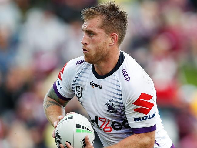 Cameron Munster of the Storm runs the ball during the Round One NRL match between Manly Sea Eagles and Melbourne Storm at Brookvale Oval in Sydney, Sunday, March 15, 2020. (AAP Image/Brendon Thorne) NO ARCHIVING, EDITORIAL USE ONLY