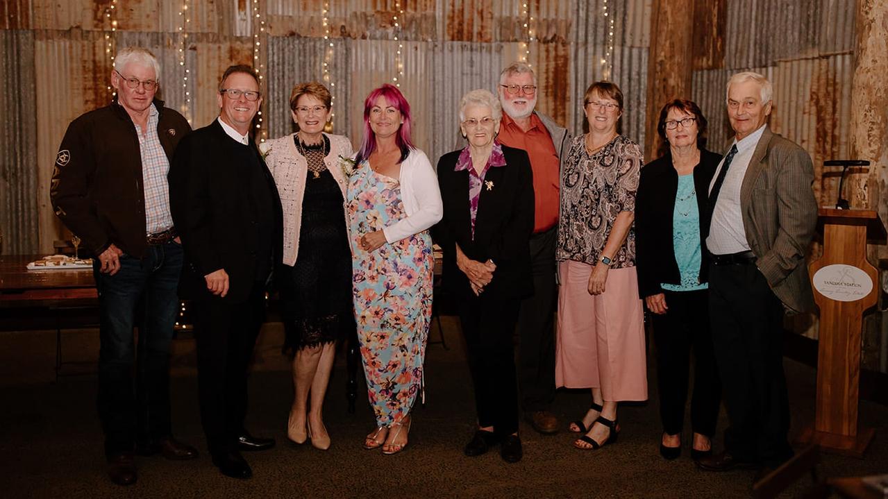 Members of the Strathdee family celebrate at the wedding of a granddaughter of Robert Strathdee.