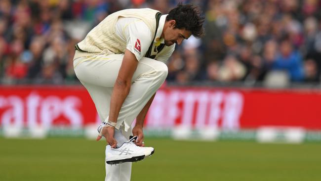 Mitchell Starc tries a change of footwear. Picture: AFP