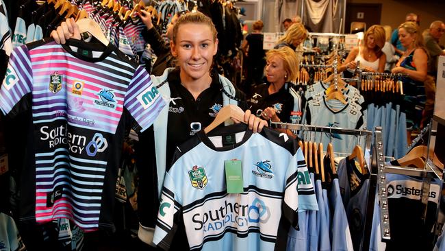 Sales assistant Elana White in the Cronulla Sharks pop up shop. Picture: Gregg Porteous