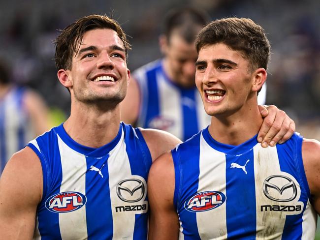 PERTH, AUSTRALIA - JUNE 08: Jy Simpkin and Harry Sheezel of the Kangaroos are happy with the win during the 2024 AFL Round 12 match between the West Coast Eagles and the North Melbourne Kangaroos at Optus Stadium on June 08, 2024 in Perth, Australia. (Photo by Daniel Carson/AFL Photos via Getty Images)