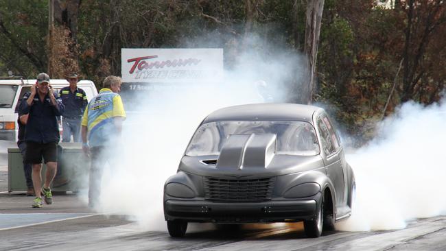 Jordan Wex heating up the tyres for maximum traction before launching his Ford 6 cylinder turbo powered Dodge PT Cruiser down the strip at Benaraby Dragway's Come and Try Day on June 27.