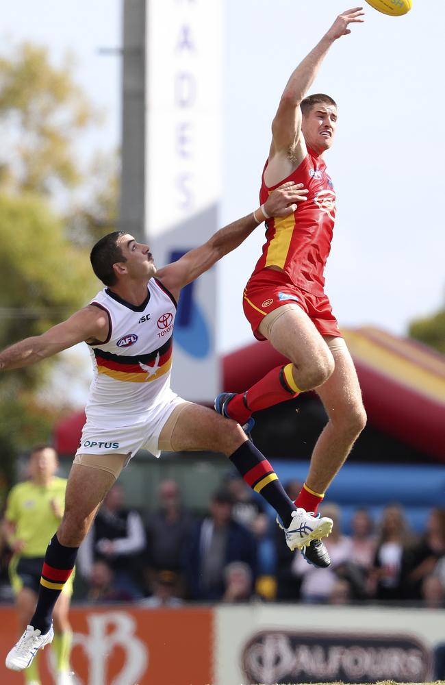 Taylor Walker, giving away 12cm of height, was no match for Zac Smith in the ruck. Picture: Sarah Reed