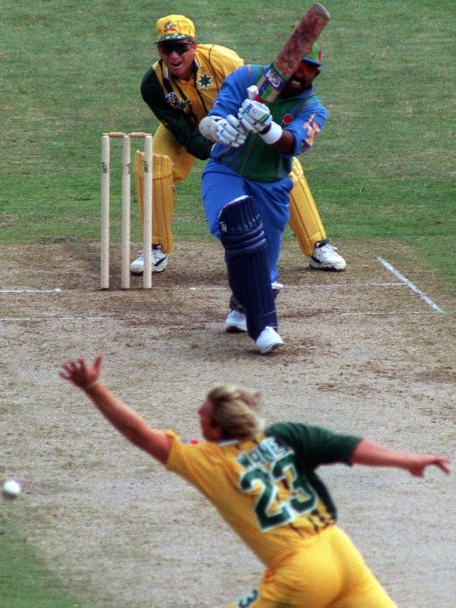 Asanka Gurusinha hits one past Shane Warne.