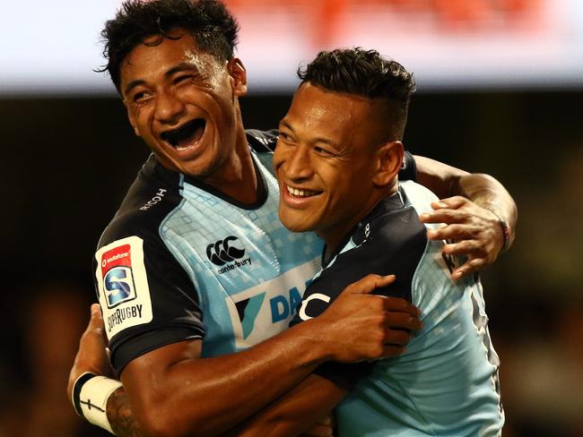 Israel Folau and Irae Simone celebrate a rare positive moment in Durban.