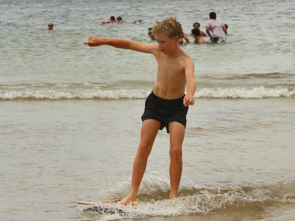 Ramsey Vaughan, 11, from Torquay enjoying Boxing Day 2024 at Fishos Beach, Torquay. Picture: Alison Wynd