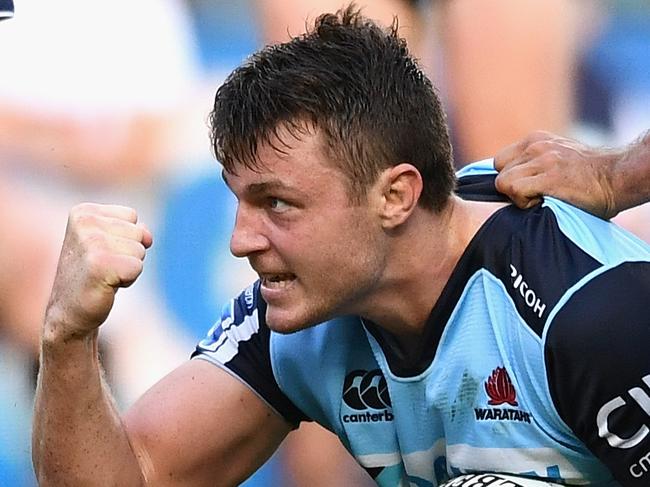 SYDNEY, AUSTRALIA - APRIL 03: Jack Dempsey of the Waratahs scores a try during the round six Super Rugby match between the New South Wales Waratahs and the Melbourne Rebels at Allianz Stadium on April 3, 2016 in Sydney, Australia. (Photo by Cameron Spencer/Getty Images)