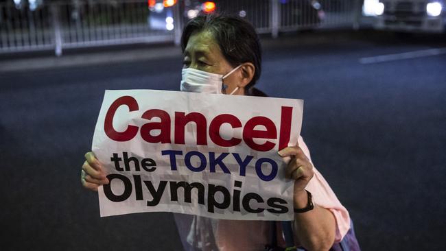 A protester makes her feelings known with a placard during a demonstration. Picture: Getty Images