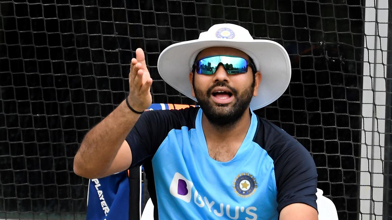 India's Rohit Sharma chats with teammates during a training session at the MCG. Picture: William WEST/AFP