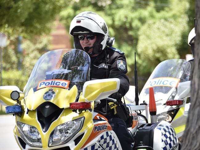 MOBILE RADAR: Toowoomba Road Policing Unit, Sergeant Sean Whittet explains the new Raptor Mobile Radar unit fitted on Police motorbikes.Toowoomba Police, traffic branch. Photo Bev Lacey / The Chronicle