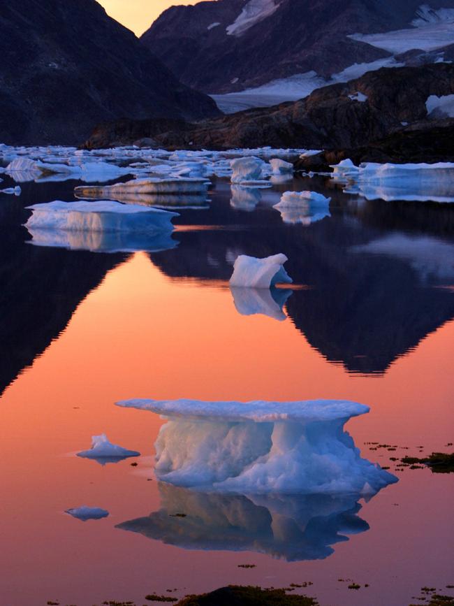 An iceberg floats in the bay in Kulusuk, Greenland. Picture: AP