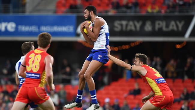 North Melbourne and Gold Coast played in front of empty stands at Metricon Stadium. Picture: AAP