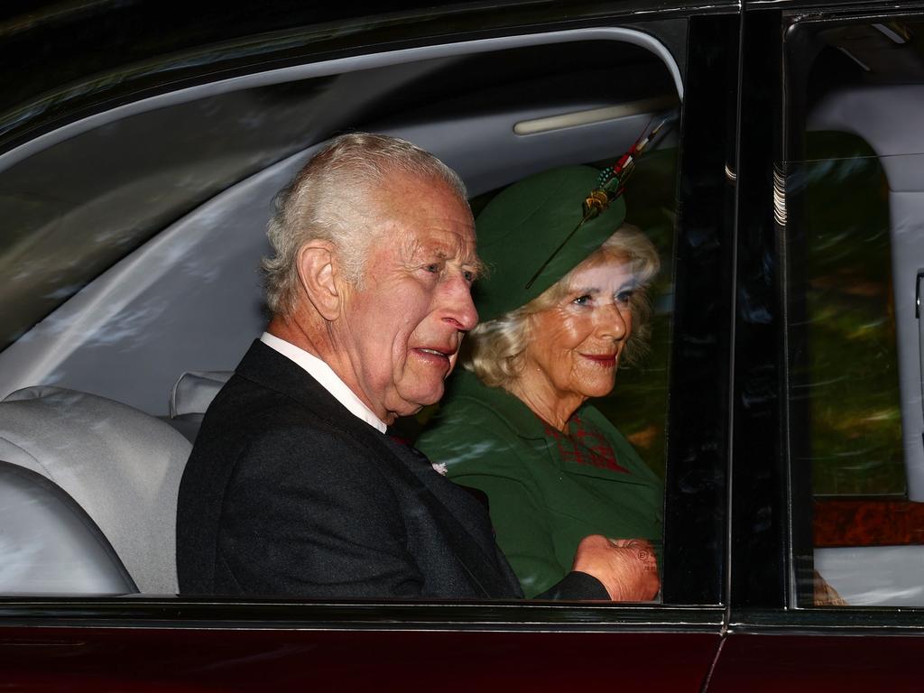 King Charles III and Queen Camilla arrive by car at Crathie Kirk. Picture: Getty Images