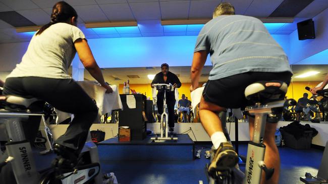 This latest study on links between excess body fat and brain function is further encouragement to get weight down. Above, a ‘spinning’ class in the US. Picture: Jewel Samad/AFP