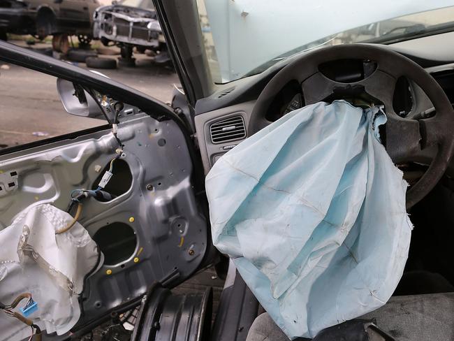 Major recall ... A deployed airbag is seen in a 2001 Honda Accord. Picture: Joe Raedle / Getty Images / AFP