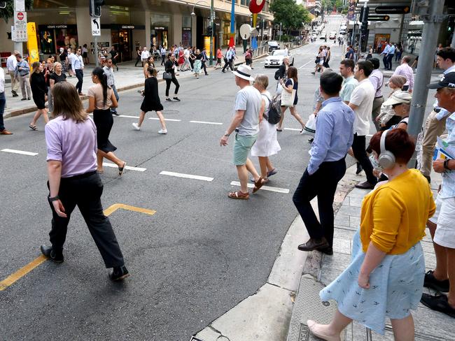 General pictures of crowds and office workers returning to the Brisbane CBD Brisbane Monday 14th March 2022 Picture David Clark