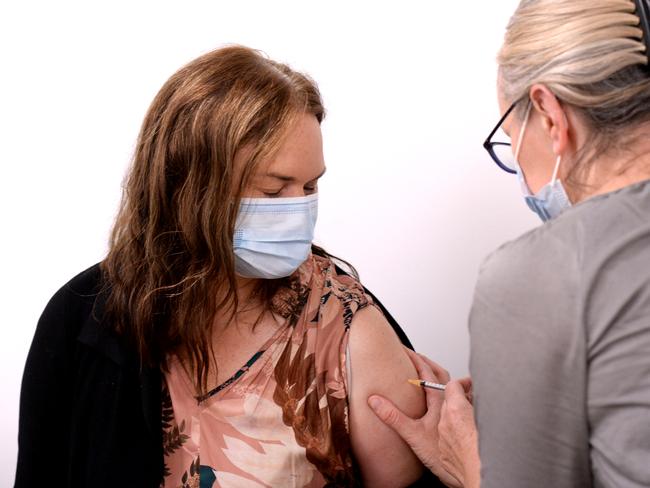 Dr Rachel Rosler, Director, Emergency Medicine, receives her second Pfizer COVID-19 vaccine from Immunisation Nurse Emily at Monash Medical Centre. Picture: NCA NewsWire / Andrew Henshaw