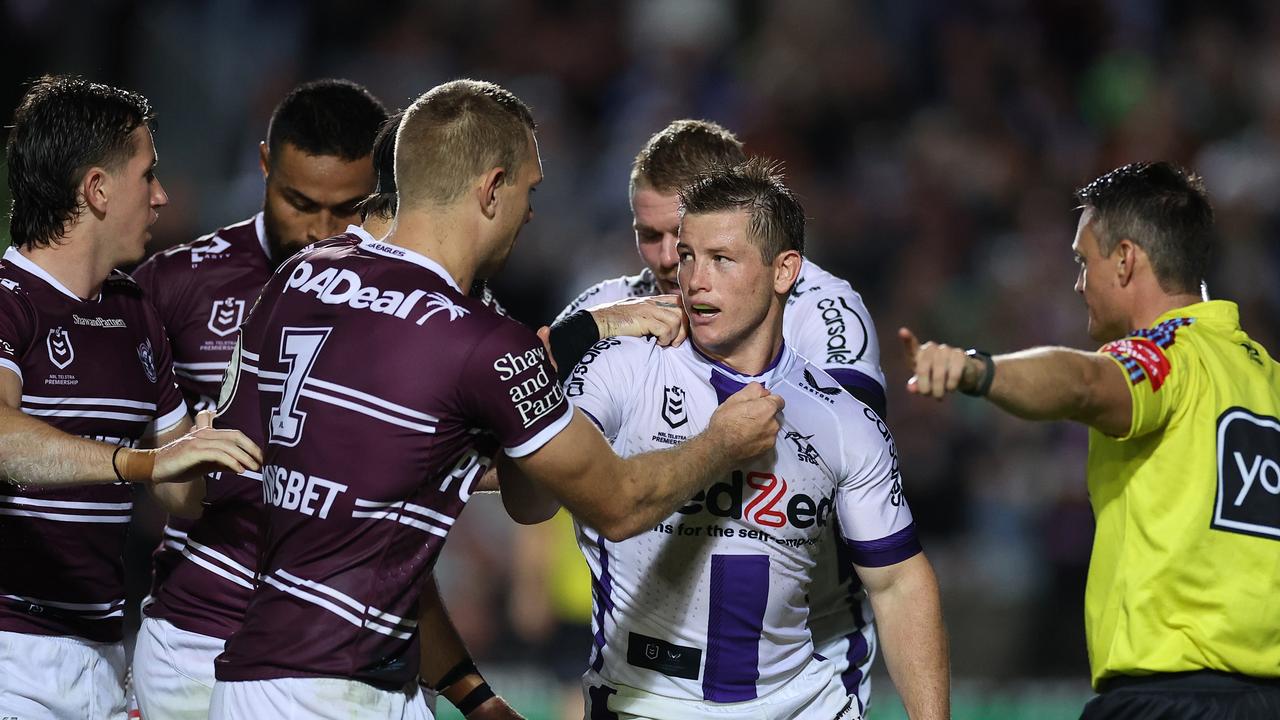 Storm hooker Harry Grant scuffles with Sea Eagles star Tom Trbojevic as players from both teams face off. Picture: Getty Images