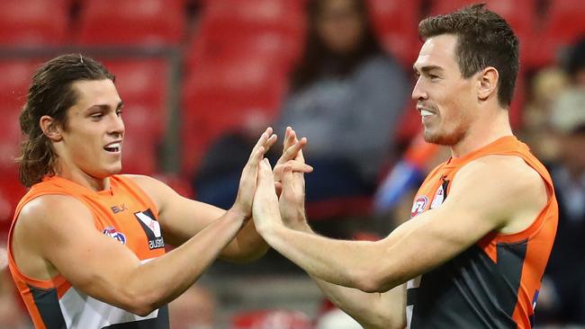 Jack Steele congratulates team mate Jeremy Cameron. (Photo by Cameron Spencer/Getty Images)