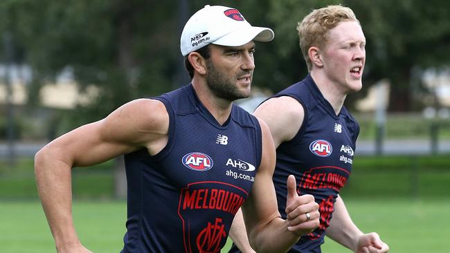 Jordan Lewis and Clayton Oliver train side-by-side. Picture: Wayne Ludbey