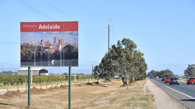 Stuck in the 1990s — the aging Welcome to Adelaide sign is on the Port Wakefield Road near Virginia. Picture: AAP / Keryn Stevens