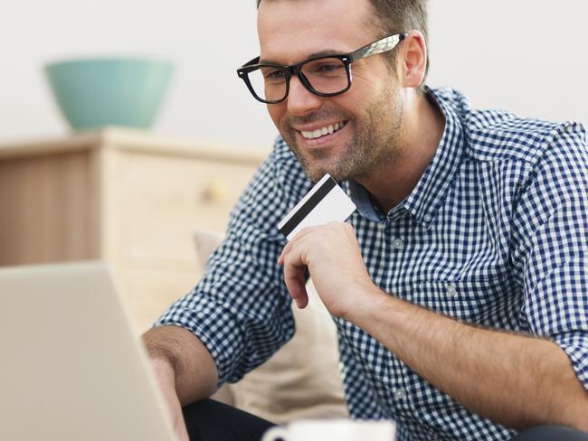 A man using a credit card to pay for goods. Picture: iStock.