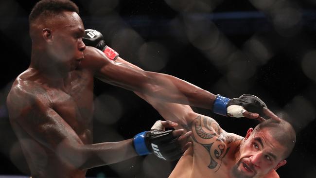 UFC 243 at Marvel Stadium, Melbourne. Robert Whittaker vs Israel Adesanya . Robert Whittaker and Israel Adesanya 2nd round .Picture: Michael Klein.