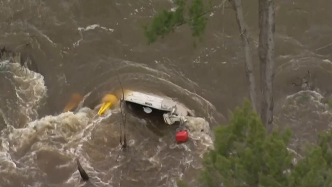 Two people winched to safety after boat capsizes