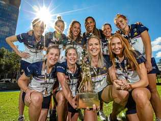 Sunshine Coast Lightning players pose for a photograph their championship trophy in Perth, Monday, August 27, 2018. The Sunshine Coast Lightning beat West Coast Fever to win the 2018 Super Netball competition. Picture: RICHARD WAINWRIGHT