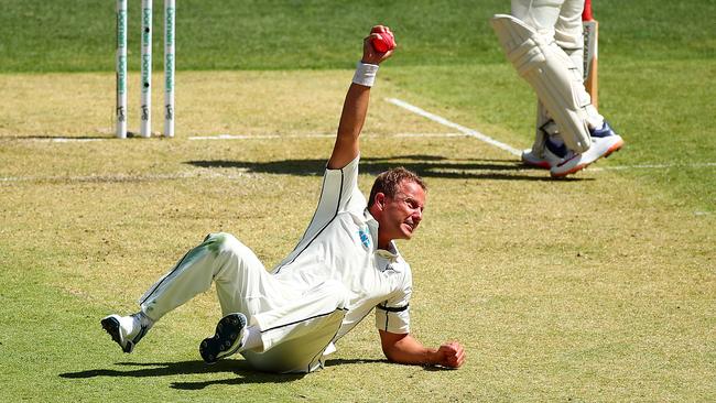 Neil Wagner holds the ball aloft after his brilliant catch. Picture: Getty Images