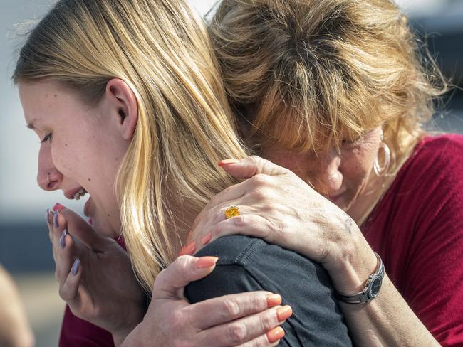 Santa Fe High School student Dakota Shrader is comforted by her mother Susan Davidson after her friend was shot, with eight reportedly dead. Picture: Stuart Villanueva/The Galveston County Daily News via AP