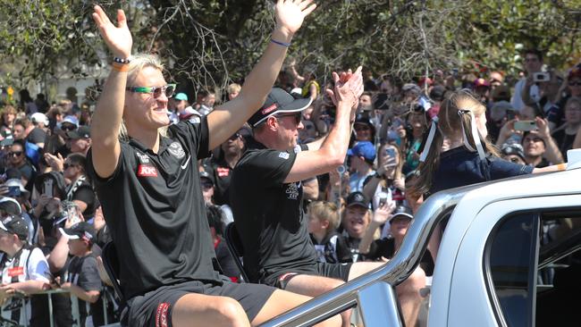 Moore and coach Craig McRae soak up the atmosphere. Picture: NCA NewsWire / David Crosling