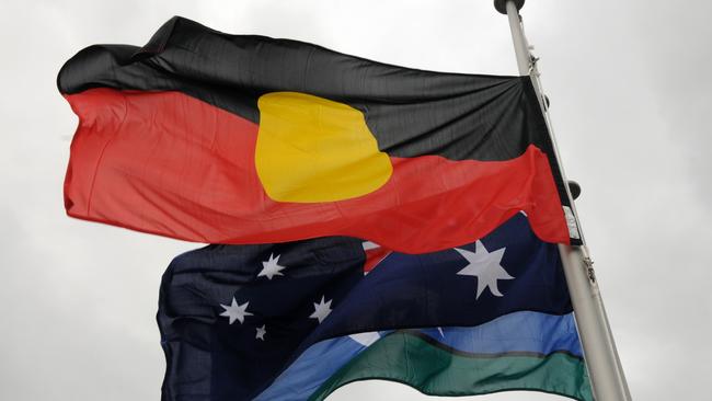 Melbourne councils say they will fly the Aboriginal, Australian and Torres Strait Islander flags at full-mast on January 26 — with the exception of one council. Picture: Craig Warhurst