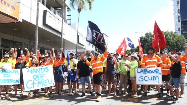 Electrical Trades Union Far Northern organiser Rob Hill flanked by fellow union members on Lake St in the Cairns CBD on Tuesday, August 27. Picture: Peter Carruthers