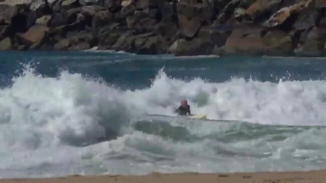 Joel Taylor surfing