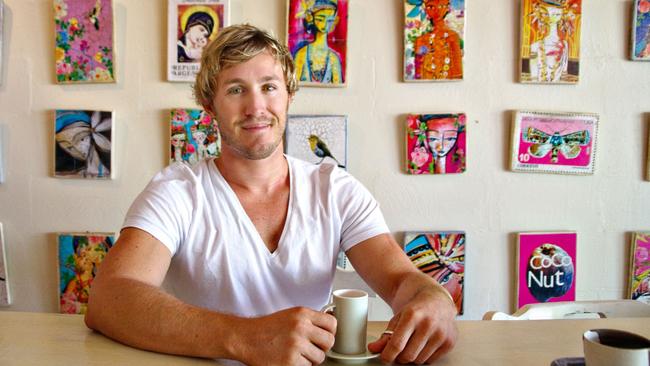 Jai Vasicek enjoying a coffee at his gallery cafe.